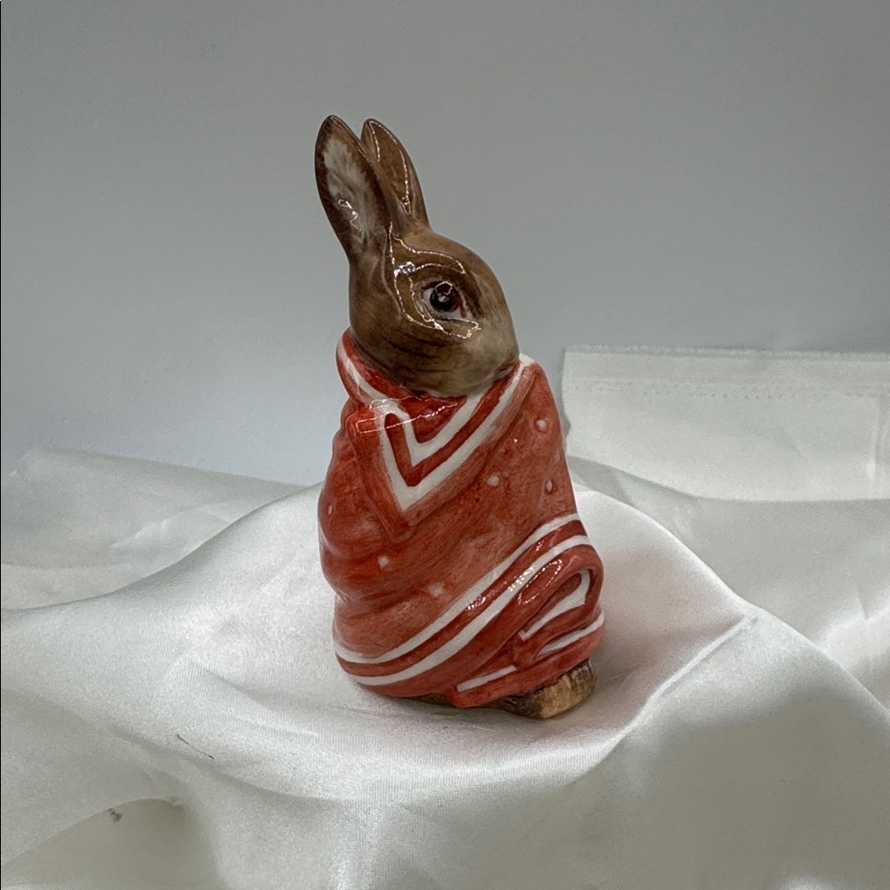 Beswick Beatrix Potter "Poorly Peter Rabbit" figurine, wrapped in a blanket,